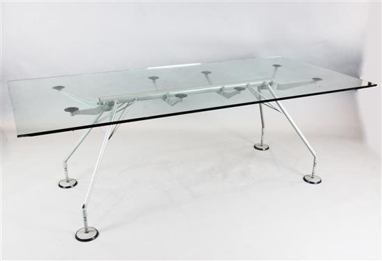 Norman Foster for Tecno. A glass top Nomos table, W.7ft 3in. D.3ft 3in.